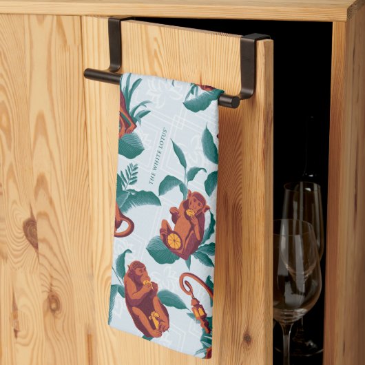 Das Muster des weißen Lotus spielt für die Affen Geschirrtuch (Drittel gefaltet)