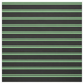 Das Muster ist grün und schwarz. Stoff (Muster)