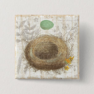 Das Nest eines Vogels mit einem grünen Ei Button