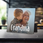 Das Niedlichste GRANDMA-Foto-Geschenk Fotoplatte<br><div class="desc">Lass einer Großmutter weiß, wie sehr sie damit geliebt wird; Niedlich Modern Custom Foto Oma Plaque. Design bietet lustige weiße Typografie, die "The Most Loved GRANDMA" heißt. Laden Sie einfach Ihr Lieblingsbild hoch und personalisieren Sie die Namen, von wem es stammt. Die Textfarbe kann mit dem Werkzeug 'Weitere Anpassung' geändert...</div>