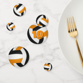 Das orangefarbene Team ist ein kleines Volleyball- Konfetti