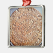 Das Phaistos Disc, mit unbekannter Bedeutung Silbernes Ornament (Links)