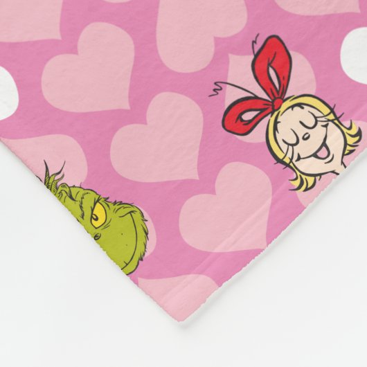 Das rosa Grinch- und Cindy-Lou-Herzmuster Fleecedecke (Ecke)