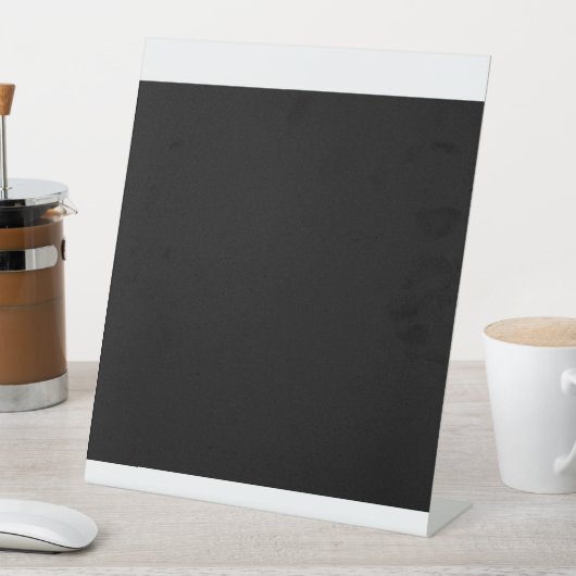 Das Schwarz-Weiß-Foto eines Vintagen Sockelschild (In Situ)