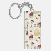 Das süße Muster mit verschiedenen Desserts. Schlüsselanhänger (Vorderseite links)
