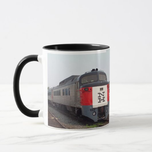 Das Zug-Set Roger Williams Tasse (Links)