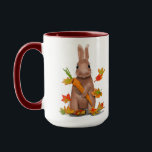 DE Tasse Hase im Herbst<br><div class="desc">Hui ui,  Blätter fallen,  Ernten werden eingefahren,  so hat auch der Hase seine Karotte aus der Erde geholt und freut sich mit dir auf eine heiße Tasse Kakao,  Tee oder Kaffee,  hol ihn dir und genieße den Herbst!</div>