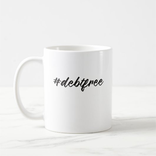 #debtfree (Hashtag Schulden frei) Pinsel Kaffeetasse (Links)