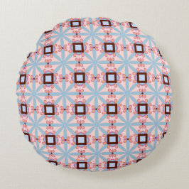 decorative pillow featuring a geometric pattern rundes kissen