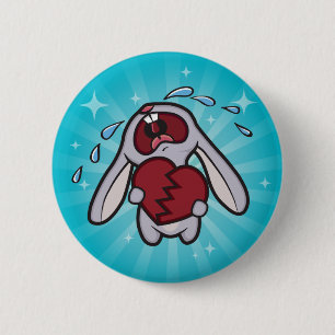 Defektes herziges Häschen mit blauem Button