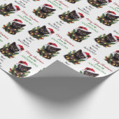 Definition der schmuddeligen Katze, die in Weihnac Geschenkpapier (Ecke)