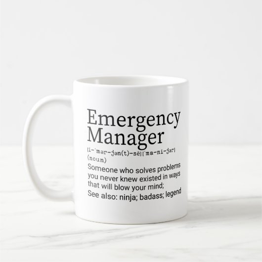 Definition des "Funny Emergency Manager" Kaffeetasse (Links)