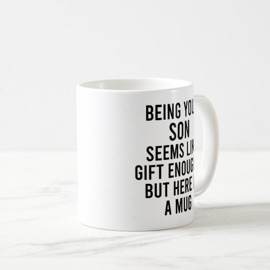 Dein Sohn scheint wie Geschenk genug zu sein, aber Kaffeetasse (VorderseiteRechts)