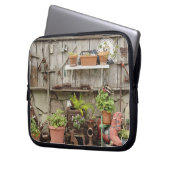 Dekorationen auf Holzzaun, Laptopschutzhülle (Vorderseite Links)