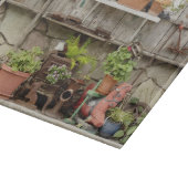 Dekorationen auf Holzzaun, Schneidebrett (Ecke)