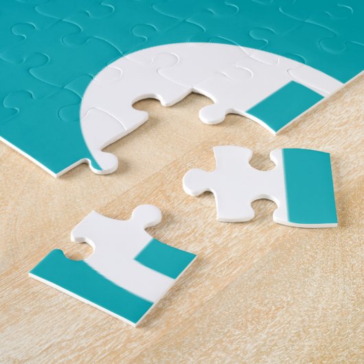 Dekorative Buchstaben auf blauem Hintergrund Puzzle (Seite)