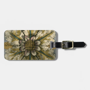 Dekorative Demaskrosette auf grauem Hintergrund Gepäckanhänger