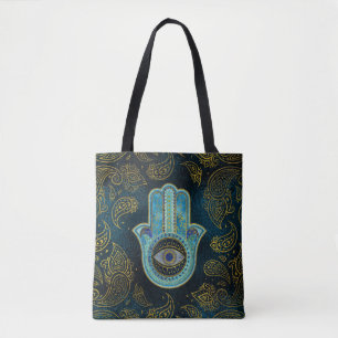 Dekorative Hamsa Hand mit Paisley-Hintergrund Tasche