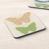 Dekorative Schmetterlingsmuster auf Cremehintergru Getränkeuntersetzer (Linke Seite)