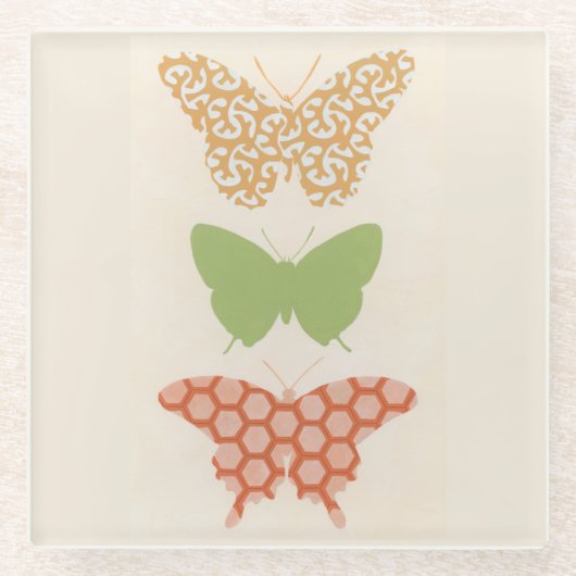 Dekorative Schmetterlingsmuster auf Cremehintergru Glasuntersetzer (Vorderseite)