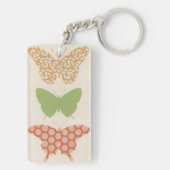 Dekorative Schmetterlingsmuster auf Cremehintergru Schlüsselanhänger (Rückseite)