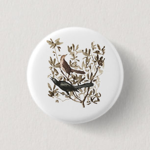 Dekorative Vintage-Wasserfarben-Vögel auf Zweigen Button