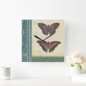 Dekorativer Schmetterlings-Brokat durch Quadratische Wanduhr (Zuhause)