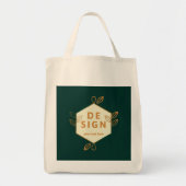Dekoratives cremefarbenes Sechseck-Logo auf dunkle Tragetasche (Vorne)