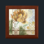 Dekoratives Fresco-Design mit Globe-Blume Geschenkbox<br><div class="desc">Dieses dekorative Freskendesign von Megan Meagher besticht durch eine Blume aus der Welt. Ein abstrakter Hintergrund umgibt die Blume und schafft ein surreales Ambiente,  das der realistischen Blume widerspricht.</div>