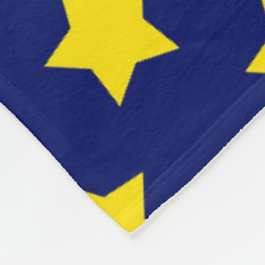 Dekoratives Muster aus blaugelben Sternen Fleecedecke (Ecke)