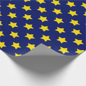 Dekoratives Muster aus blaugelben Sternen Geschenkpapier (Ecke)
