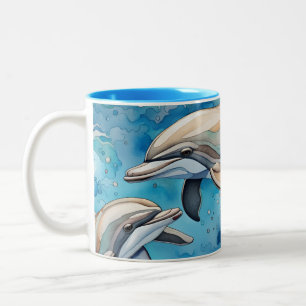 Delfine schwimmen im Meer  Zweifarbige Tasse