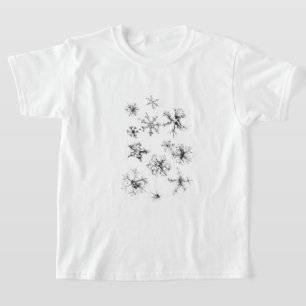 Delikate fallende Schneeflocken T-Shirt