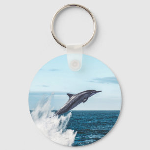 Delphin, die aus dem Ozean springen Schlüsselanhänger
