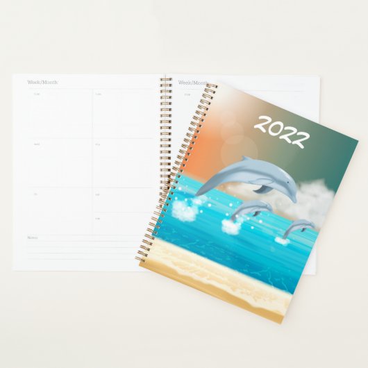 Delphine, die im Ozean brechen Planer (Anzeige)