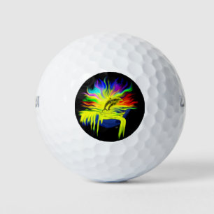 Delphine im Sonnenschein mit der Hand Golfball