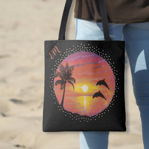 Delphine spielen im Sonnenuntergang Tasche