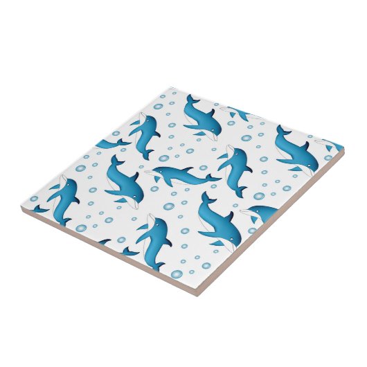 Delphine und Blasen auf weiß. Keramikfliese (Seite)