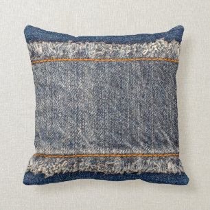 Denimblaue Jeansstoff Rahmung. Gebleichter Denimst Kissen