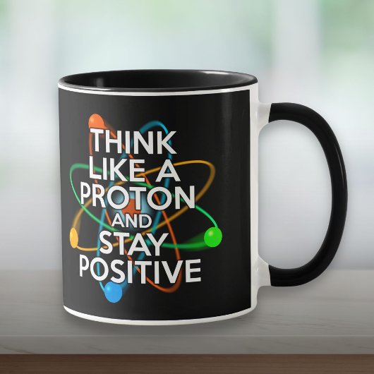 DENKEN SIE WIE EIN PROTON UND BLEIBE POSITIV TASSE