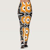 deometrischer gelber und schwarzer Muster Leggings (Rückseite)