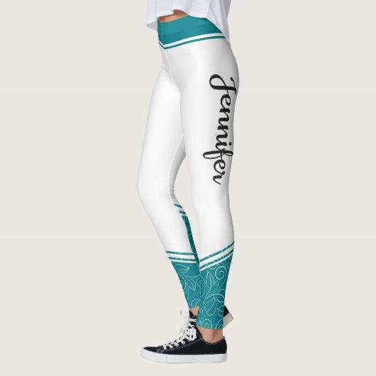 Der aquamarine, weiße, blumenweiße Name des Design Leggings (Links)