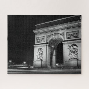 Der Arc de Triomphe nachts in Paris Puzzle