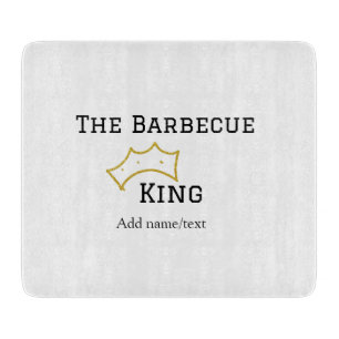 Der Barbecue-König krönt Namenstext kocht am beste Schneidebrett