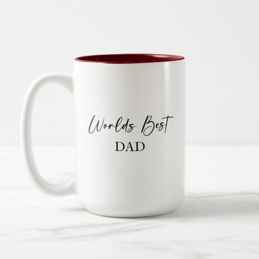 Der beste Vater der Welt und die beliebteste perso Zweifarbige Tasse (Links)