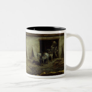 Der Brennofen bei den Gips-Arbeiten Zweifarbige Tasse