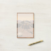 Der Erkennungsleuchter, der auf der Oberfläche von Post-it Klebezettel (Auf Schreibtisch)