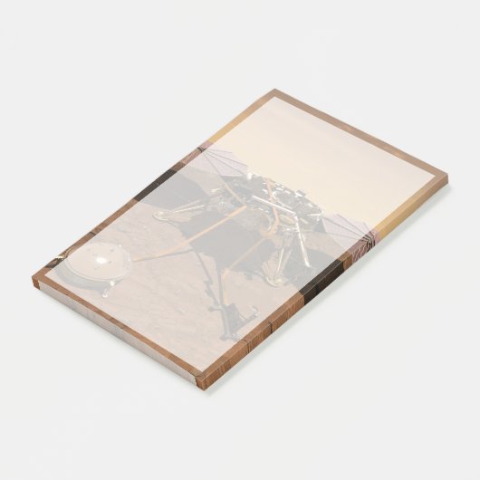 Der Erkennungsleuchter, der auf der Oberfläche von Post-it Klebezettel (angewinkelt)