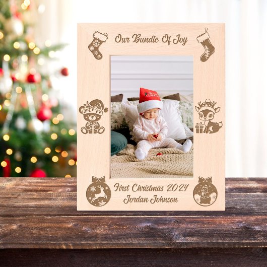 Der erste Weihnachtslaser des Babys ist geätzt Geätzte Rahmen