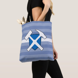 Der Felsen-Hammer des Geologen mit Flagge von Tasche